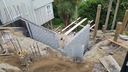 Drilling holes 6 metres deep after placing the poles and filling them with concrete for the pole extension for new town houses.